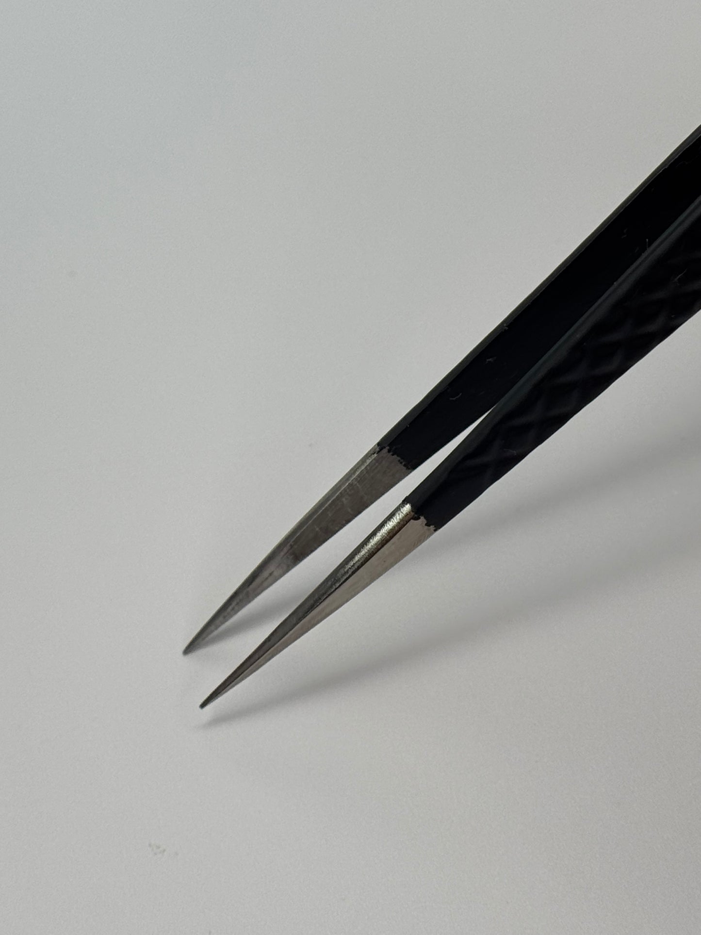 Isolation tweezers